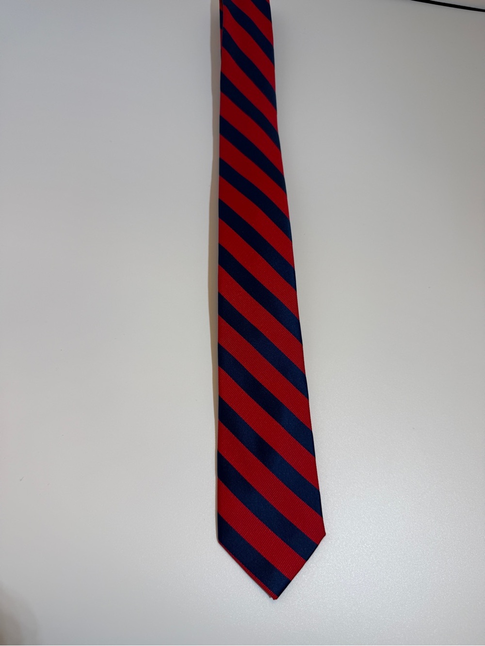 Izod Men's Narrow Red and Navy Diagonal Stripe Tie - Picture 2 of 3